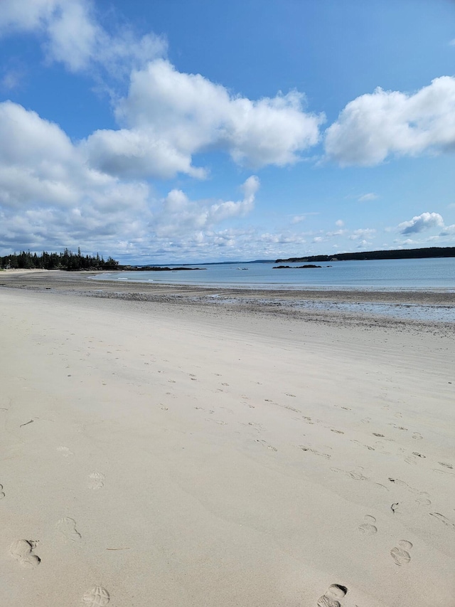 property view of water with a beach view