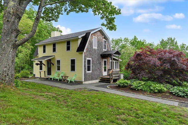 exterior space featuring a yard and a patio