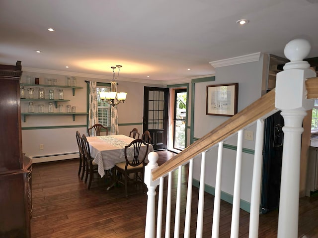 dining space with a chandelier, dark hardwood / wood-style floors, a baseboard radiator, and ornamental molding