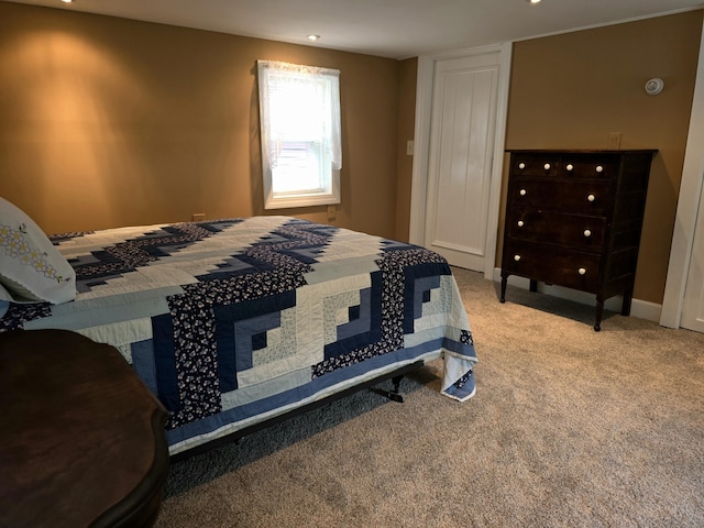 bedroom with light colored carpet