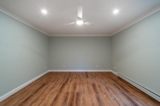 empty room with wood-type flooring, crown molding, ceiling fan, and a baseboard heating unit