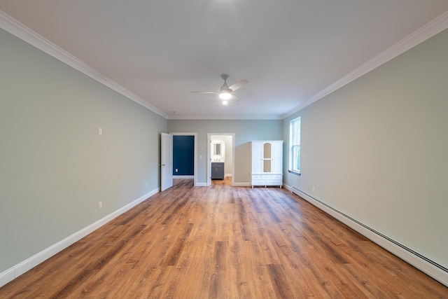 unfurnished room featuring ornamental molding, hardwood / wood-style flooring, ceiling fan, and a baseboard heating unit