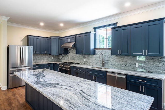 kitchen with sink, light stone counters, dark hardwood / wood-style floors, decorative backsplash, and appliances with stainless steel finishes