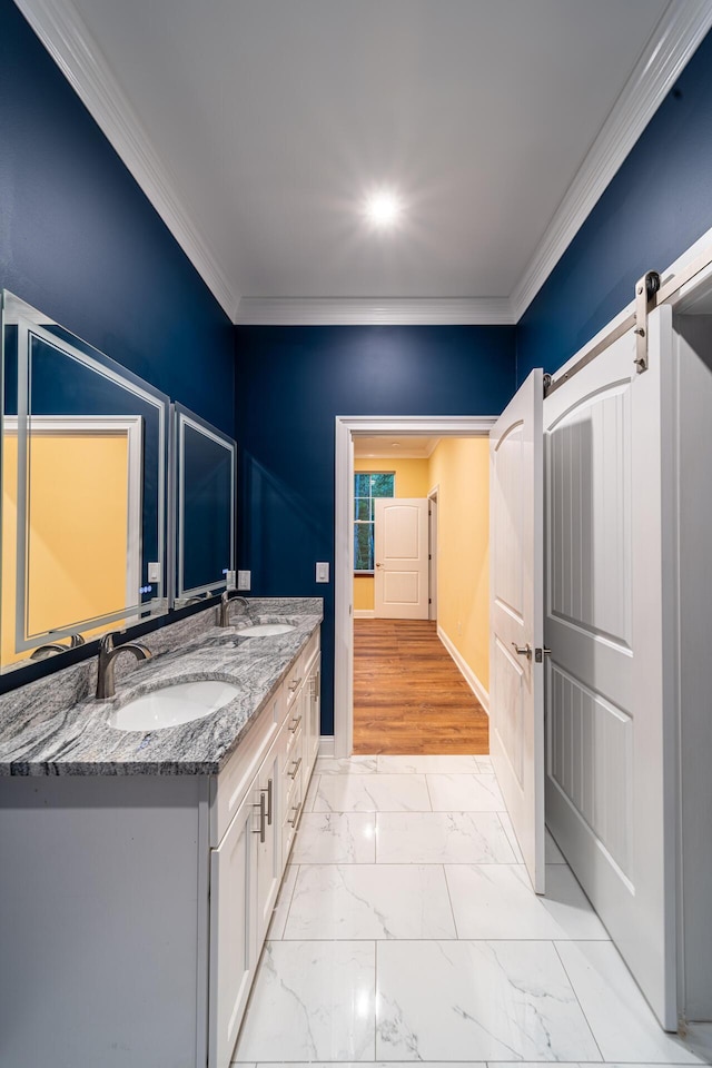 bathroom featuring vanity and ornamental molding