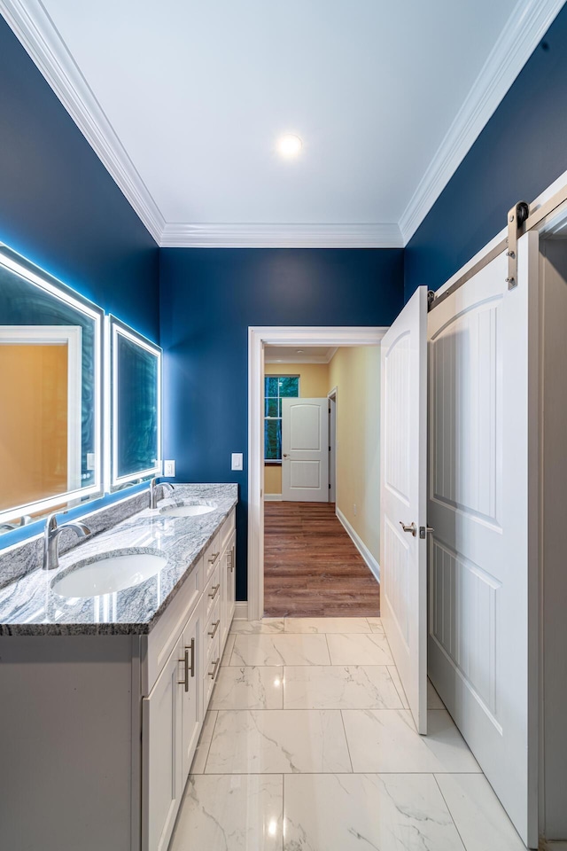 bathroom featuring vanity and ornamental molding