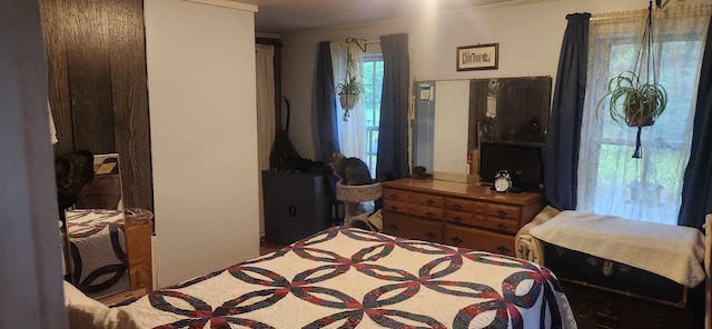 bedroom featuring crown molding