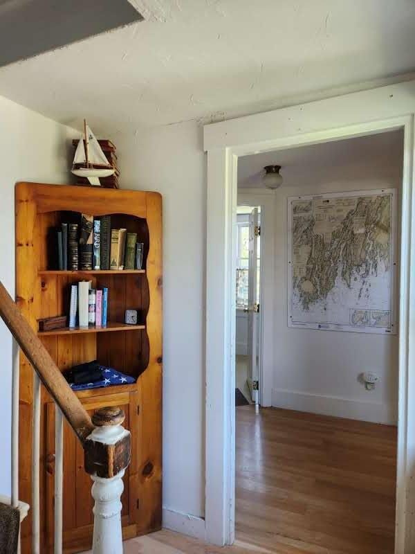 hall featuring hardwood / wood-style floors