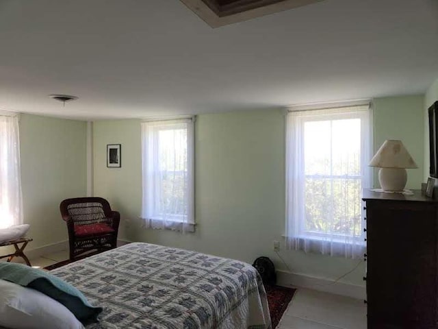 bedroom featuring multiple windows