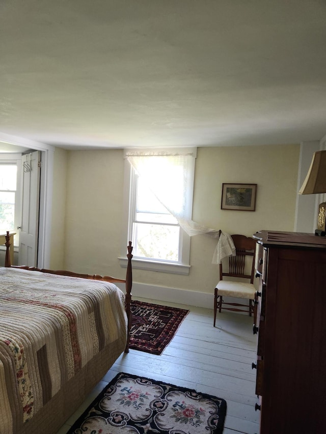 bedroom with light hardwood / wood-style flooring