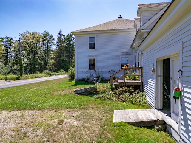 exterior space with a yard