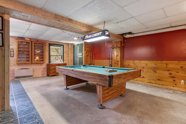 playroom with wood walls, a paneled ceiling, and pool table