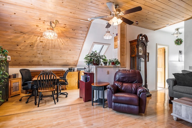 office space with light hardwood / wood-style flooring, lofted ceiling with skylight, and wooden ceiling