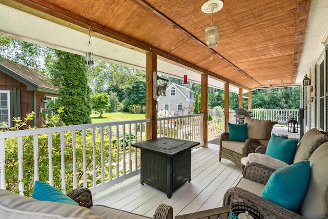 deck with an outdoor hangout area