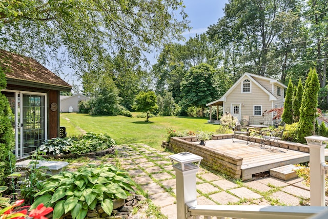 view of yard with a deck