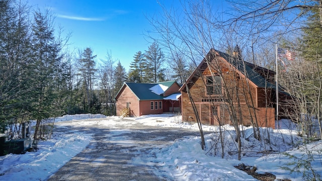 view of snow covered property