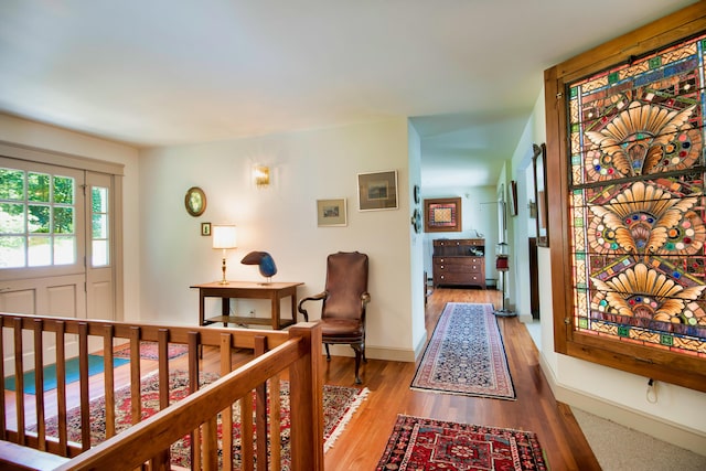 corridor featuring light hardwood / wood-style floors