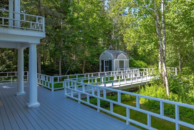 11 Bunkers Ledge Ln, Cranberry Isles, ME 04625 - wooden terrace with an outbuilding and a storage shed