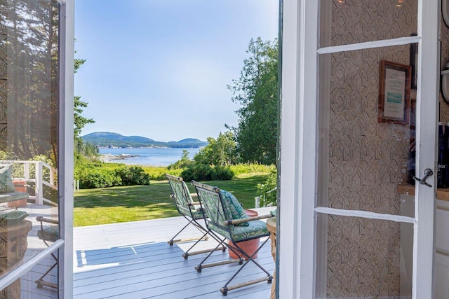 11 Bunkers Ledge Ln, Cranberry Isles, ME 04625 - doorway featuring a water and mountain view