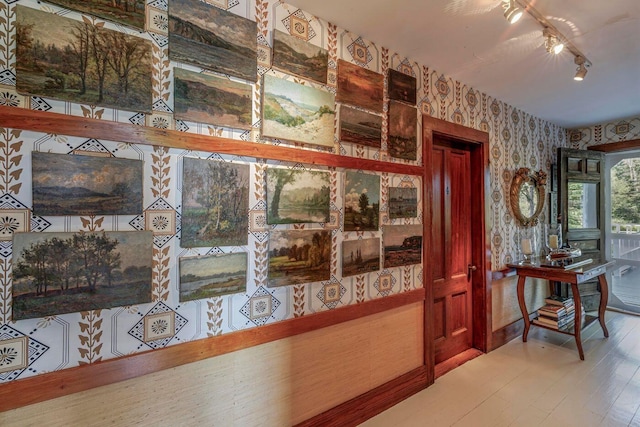 11 Bunkers Ledge Ln, Cranberry Isles, ME 04625 - hall with baseboards, wallpapered walls, and wood finished floors