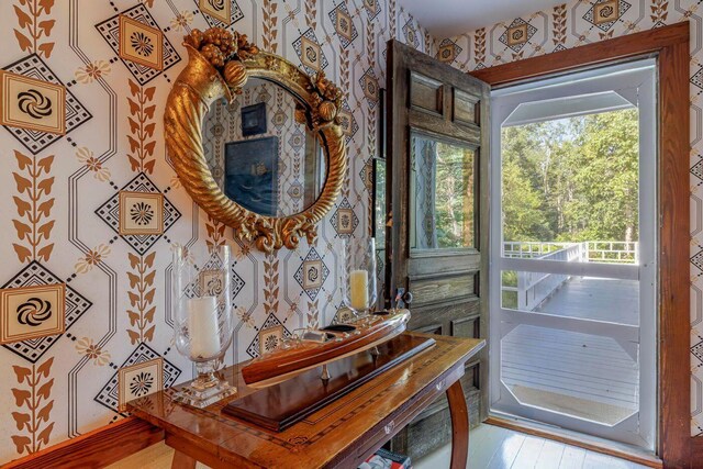 11 Bunkers Ledge Ln, Cranberry Isles, ME 04625 - room details featuring wallpapered walls and wood finished floors