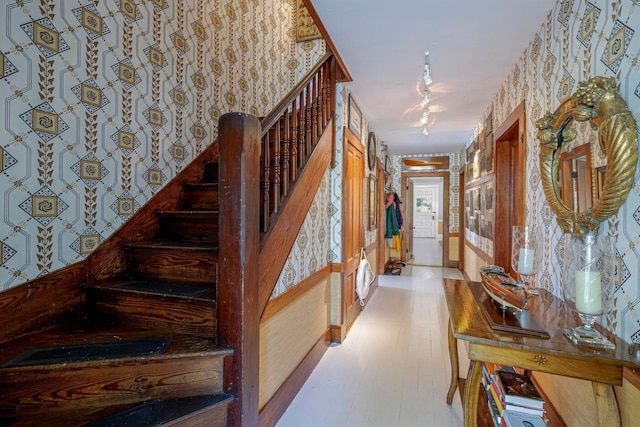 11 Bunkers Ledge Ln, Cranberry Isles, ME 04625 - stairway with wallpapered walls and wood finished floors