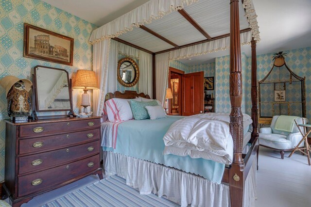11 Bunkers Ledge Ln, Cranberry Isles, ME 04625 - bedroom featuring wallpapered walls and wood finished floors