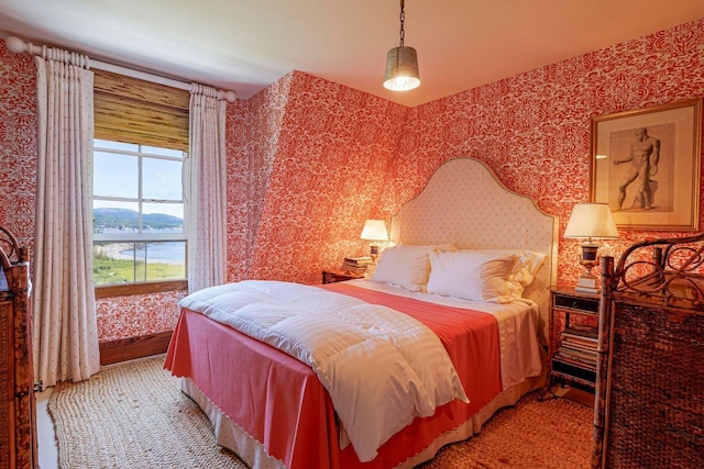 11 Bunkers Ledge Ln, Cranberry Isles, ME 04625 - bedroom with a water view and wallpapered walls