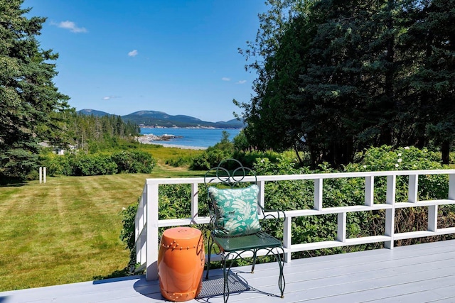 11 Bunkers Ledge Ln, Cranberry Isles, ME 04625 - wooden deck with a yard and a water and mountain view