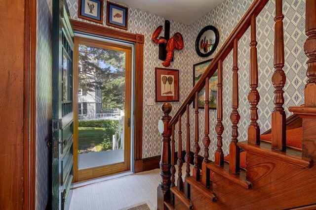 11 Bunkers Ledge Ln, Cranberry Isles, ME 04625 - foyer entrance featuring baseboards, wallpapered walls, and stairway
