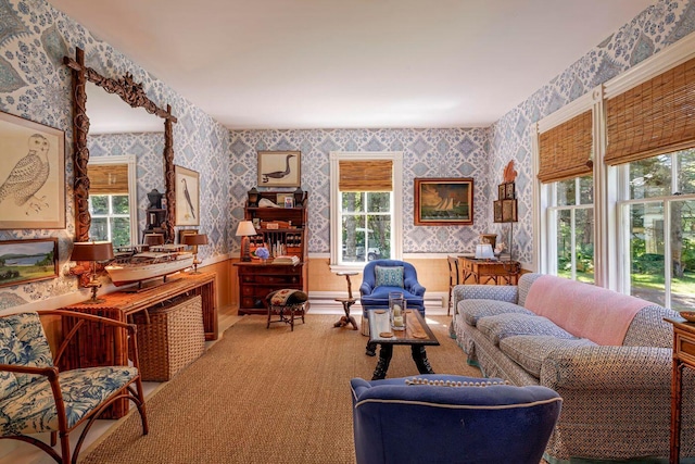 11 Bunkers Ledge Ln, Cranberry Isles, ME 04625 - carpeted living room with wallpapered walls and a wainscoted wall