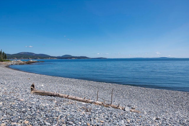 11 Bunkers Ledge Ln, Cranberry Isles, ME 04625 - property view of water with a mountain view