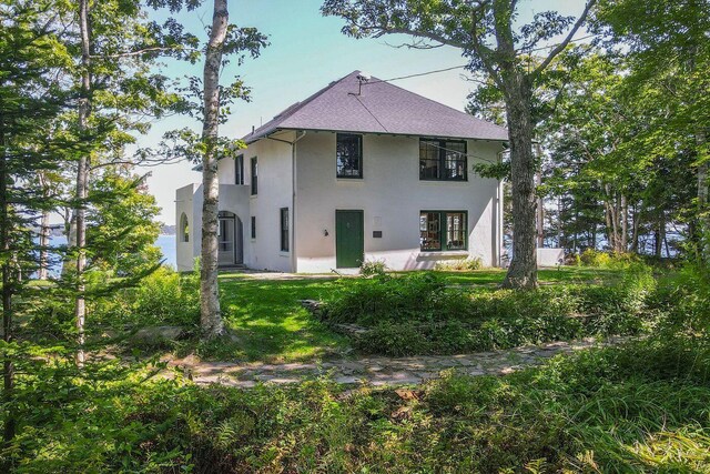 LTS23A Birch Is, South Bristol, ME 04568 - rear view of property featuring stucco siding and a yard