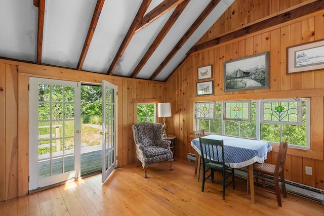 LTS23A Birch Is, South Bristol, ME 04568 - dining room with wooden walls, light wood finished floors, a baseboard radiator, and a baseboard heating unit