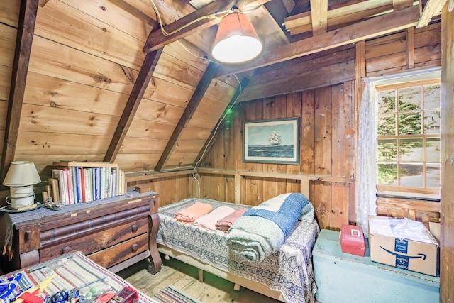 bedroom with lofted ceiling with beams, wooden ceiling, and wood walls