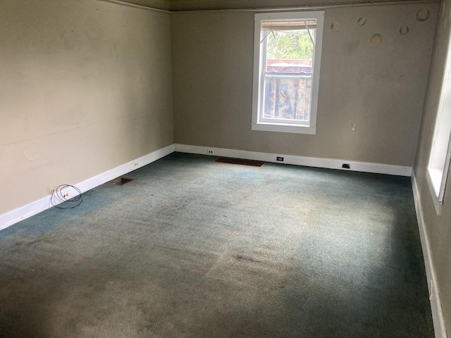 unfurnished room with carpet