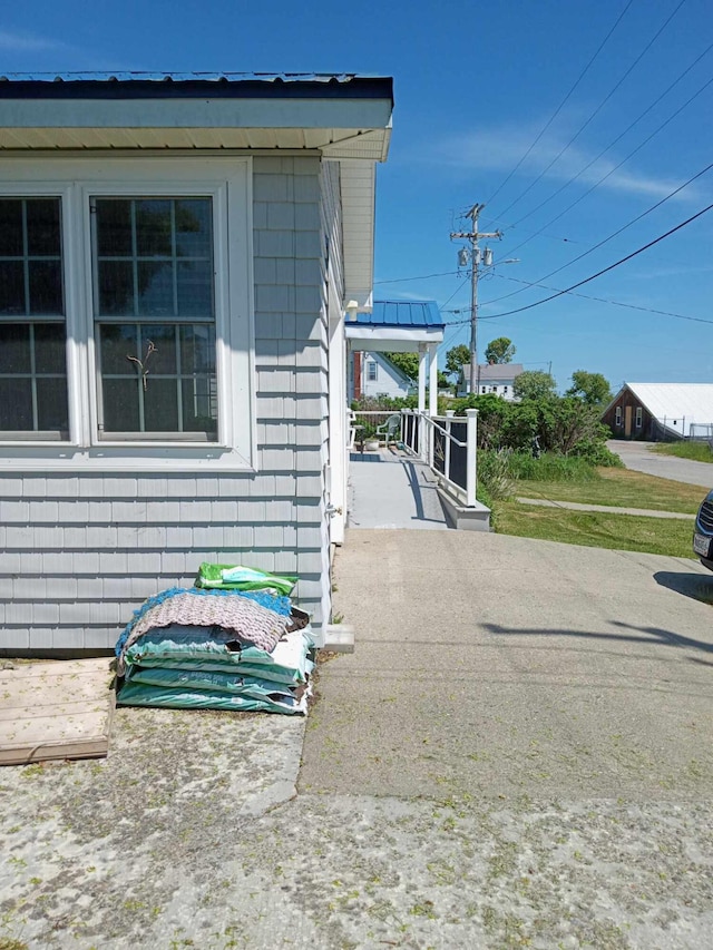 view of side of home featuring a patio area