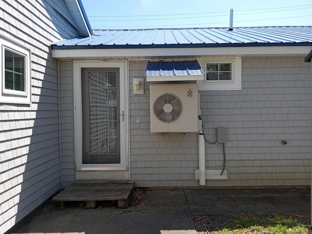 entrance to property featuring ac unit