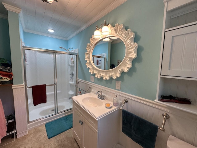 bathroom with crown molding, wood ceiling, vanity, and a shower with door