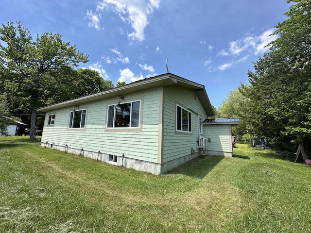 view of property exterior featuring a yard