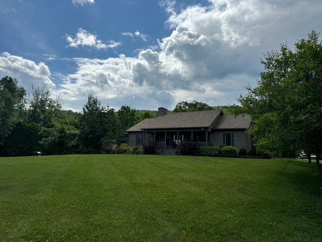 view of front of home with a front yard