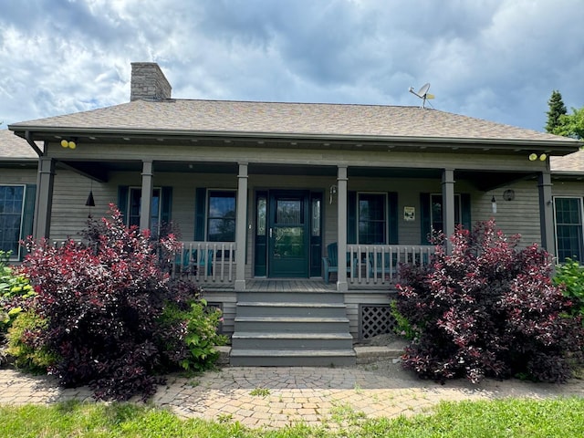 exterior space featuring covered porch