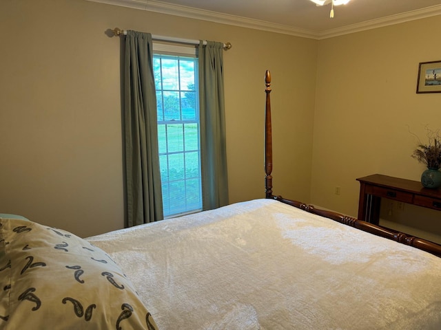 bedroom featuring crown molding