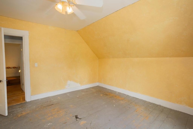 bonus room featuring ceiling fan, wood-type flooring, and lofted ceiling