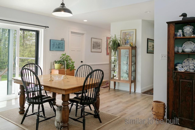 dining space featuring light hardwood / wood-style flooring