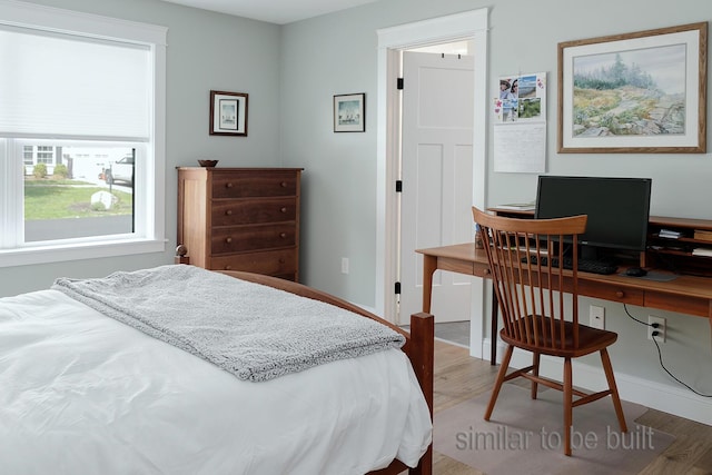 bedroom featuring wood-type flooring