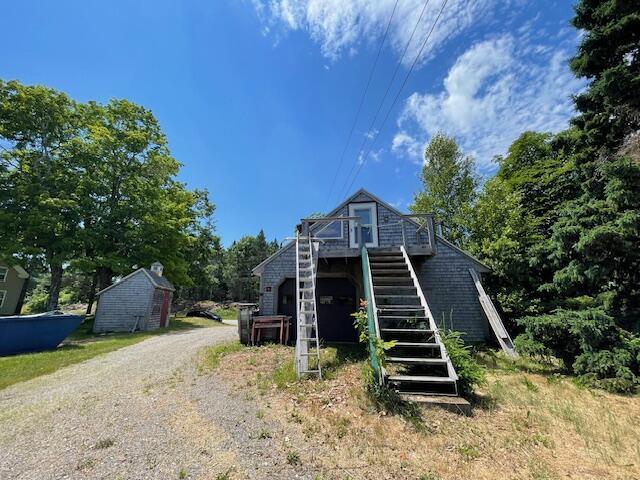 view of front of home with a wooden deck