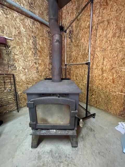 interior details featuring a wood stove