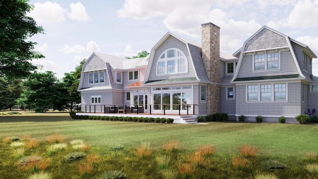 back of property featuring roof with shingles, a yard, a patio, and a gambrel roof