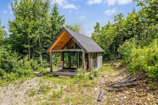 view of community with an outbuilding