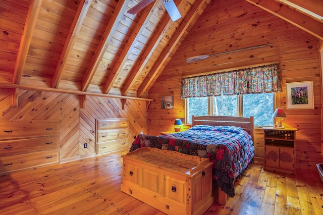 bedroom with wood ceiling, light hardwood / wood-style flooring, and wood walls